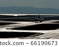 Airport/glowing runway 66190673
