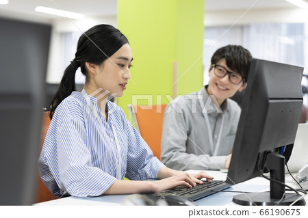 Business scene image of office workers of young men and women working side by side Business scene image of office workers of young men and women working side by side 66190675