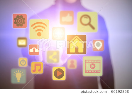 Close up of young man touching icon of media 66192868