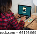 Online shopping website on laptop screen with 66193669