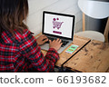 Online shopping website on laptop screen with 66193682