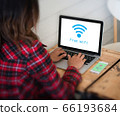 Wifi icon on laptop screen, Connecting network. 66193684