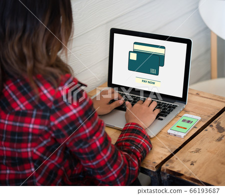 Online purchase credit card on laptop screen with 66193687