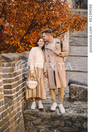 young couple kissing at the Great Wall of China young couple kissing at the Great Wall of China 66194098