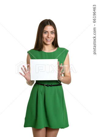 Portrait of young girl with empty sheet of paper Portrait of young girl with empty sheet of paper 66196463
