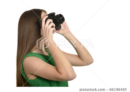 Young beautiful caucasian woman with camera over white background Young beautiful caucasian woman with camera over white background 66196485
