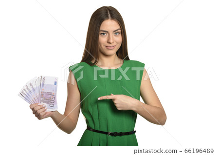 Beautiful woman in green dress with money on white background Beautiful woman in green dress with money on white background 66196489