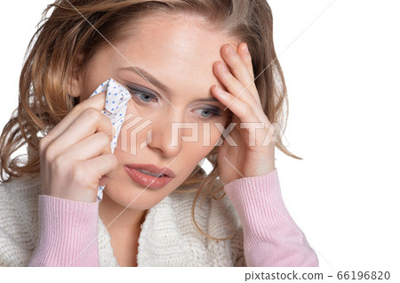 Portrait of beautiful young sad woman with blond hair Portrait of beautiful young sad woman with blond hair 66196820