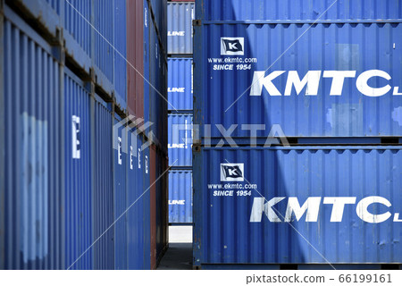 Container yard where containers are stacked Container yard where containers are stacked 66199161