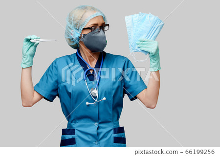 female doctor with stethoscope wearing protective mask and latex gloves over light grey background holding thermometer 66199256