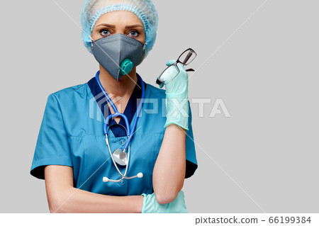 female doctor with stethoscope wearing protective mask and latex gloves over light grey background female doctor with stethoscope wearing protective mask and latex gloves over light grey background 66199384