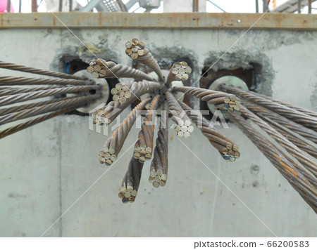 MALACCA, MALAYSIA -APRIL 14, 2016: Pre-stress cable tendons anchor head for pre-stressed concrete at the construction site. It is a technology to get better concrete slab quality with larger span.   66200583