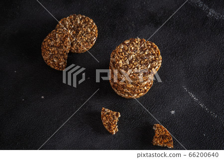 Caramel peanut brittle from sunflower seeds and Caramel peanut brittle from sunflower seeds and 66200640