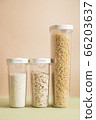 Plastic containers with cereals. Home storage products. Rice, oat and pasta. 66203637