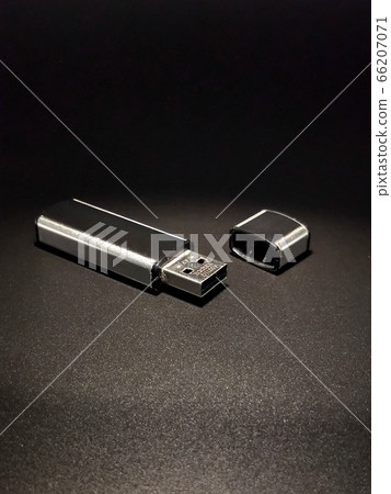 Flash drive, data carrier on a black background Flash drive, data carrier on a black background 66207071
