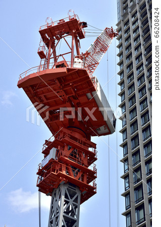 Tower crane on a high rise building construction site Tower crane on a high rise building construction site 66208424