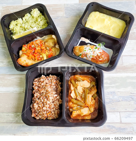 Useful food in disposable containers. Concept: proper nutrition, food delivery Useful food in disposable containers. Concept: proper nutrition, food delivery 66209497