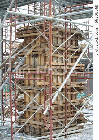 Column timber formwork and reinforcement bar at the construction site in Malacca, Malaysia. The structure supported by temporary wood support 66209969
