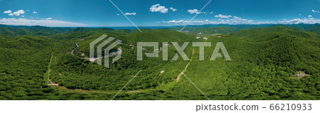 Panoramic landscape: aerial Caucasus forest panoramic background, green trees, rural highway road. 360 degree panorama. Panoramic landscape: aerial Caucasus forest panoramic background, green trees, rural highway road. 360 degree panorama. 66210933