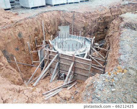 SEREMBAN, MALAYSIA -MARCH 10, 2020: Utility services manhole under construction at the construction site. In-situ construction by workers based on infrastructure engineer design. 66212425