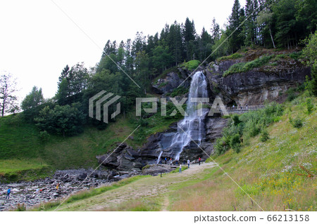 Looking back at the Steindahl waterfall on the way from Bergen to Hardangerfjord, Norway 66213158