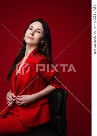 Confident beautiful woman in red jacket. Copy Confident beautiful woman in red jacket. Copy 66213429