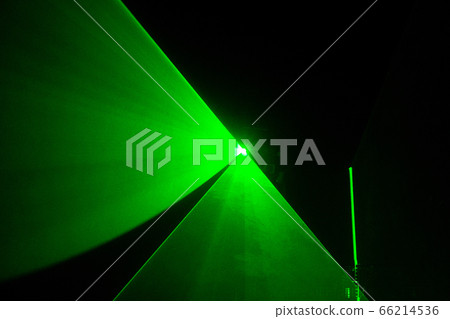 Abstract of digital green light laser line, disco light show, stage lights with laser..Green laser beams light effect on black background..Green light beam from lens projector on black background 66214536