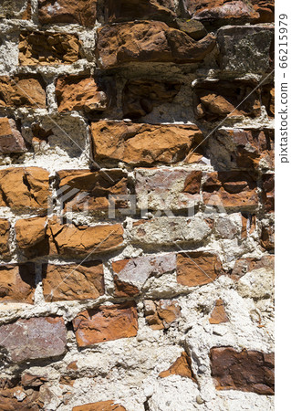 destroyed ancient brick wall 66215979