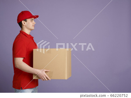 Waiting for parcel at home. Courier delivered big cardboard box to door 66220752