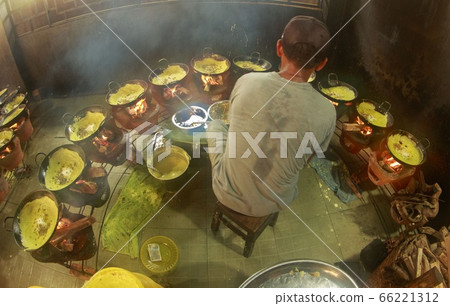 Photo of traditional craft village: making cake Xeo (Vietnam) Photo of traditional craft village: making cake Xeo (Vietnam) 66221312