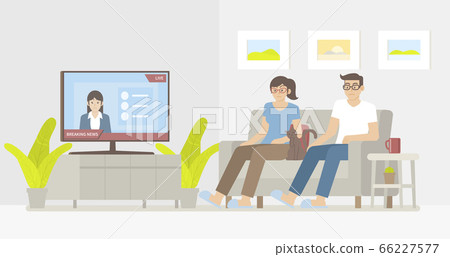 Couple watching news in living room 66227577
