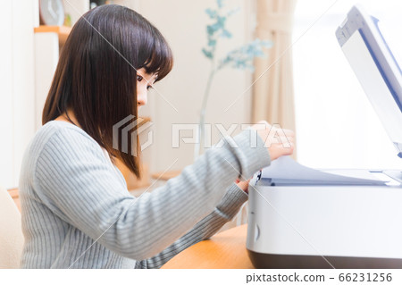 Woman scanning documents Copy space Woman scanning documents Copy space 66231256