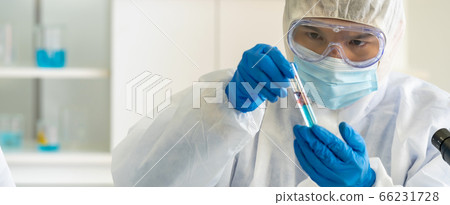 Scientists testing and researching 66231728