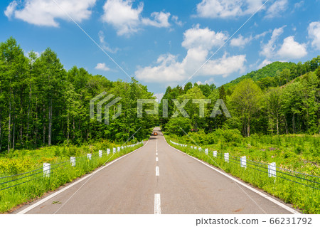 Scenery of Bandai Azuma Lake Line in early summer Blue sky and straight road Inawashiro Town, Fukushima Prefecture 66231792