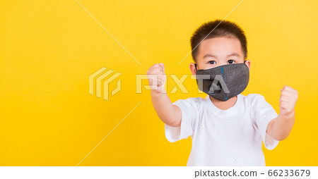 child boy wearing mask protective for covid-19 or 66233679