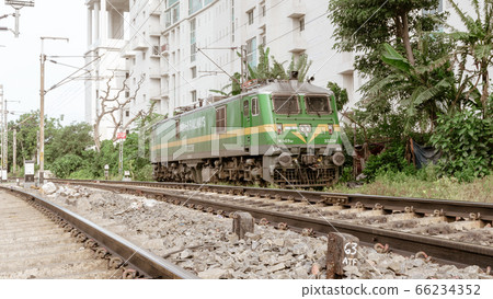 A high power electric WAG 9 locomotive loco engine wagon on rail tracks of Indian Railway. A high power electric WAG 9 locomotive loco engine wagon on rail tracks of Indian Railway. 66234352