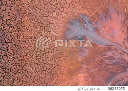 Drought Top View. Aerial view of a cracks in the ground. texture. Desert landscape. Drought Top View. Aerial view of a cracks in the ground. texture. Desert landscape. 66235055