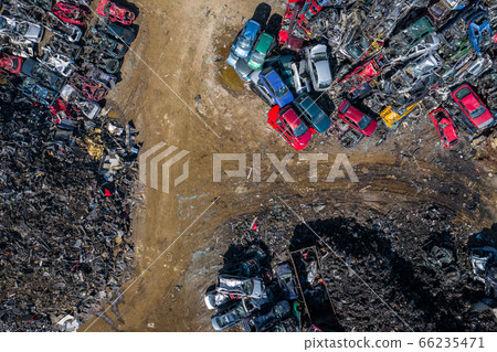 Scrapyard Aerial View. Old rusty corroded cars in car junkyard. Car recycling industry from above. 66235471