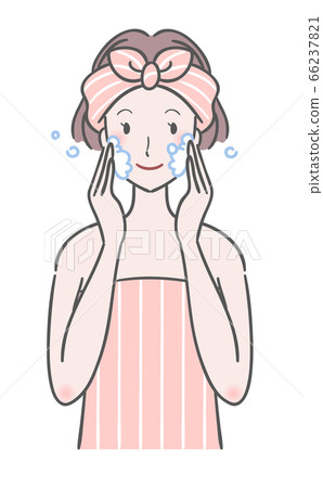 Woman cleansing the face 66237821