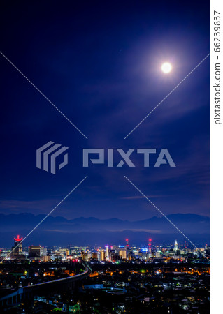 Toyama city night view and Hokuriku Shinkansen at full moon night 66239837