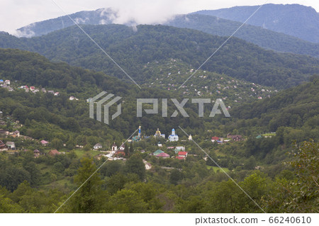 View on the village Lesnoye and Trinity-Georgievskiy female monastery in Adler district of Sochi View on the village Lesnoye and Trinity-Georgievskiy female monastery in Adler district of Sochi 66240610