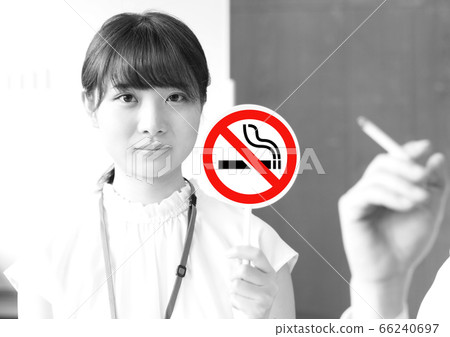 Smoking image of a woman at work Smoking image of a woman at work 66240697