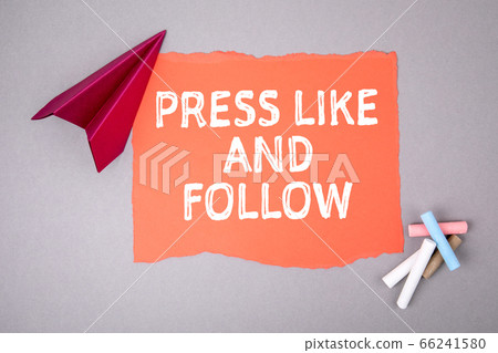 PRESS LIKE AND FOLLOW concept. Text on note sheet, paper plane, symbol of gaining goals PRESS LIKE AND FOLLOW concept. Text on note sheet, paper plane, symbol of gaining goals 66241580