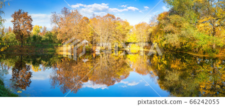 Sunny autumn in the park over lake 66242055