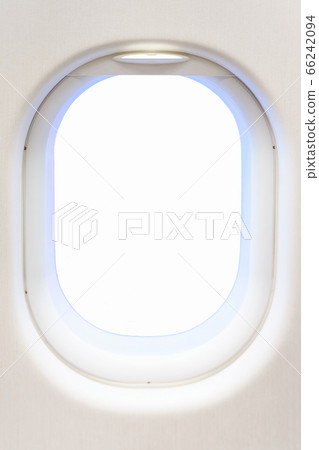 Airplane window from interior of aircraft. Business travel template for your ideas of view through porthole with clipping path 66242094