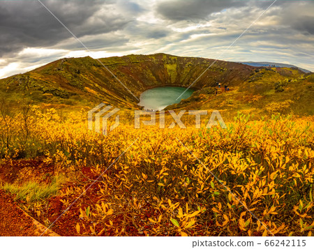 Volcanic crater Kerid with blue lake inside, Iceland tourist attraction Volcanic crater Kerid with blue lake inside, Iceland tourist attraction 66242115