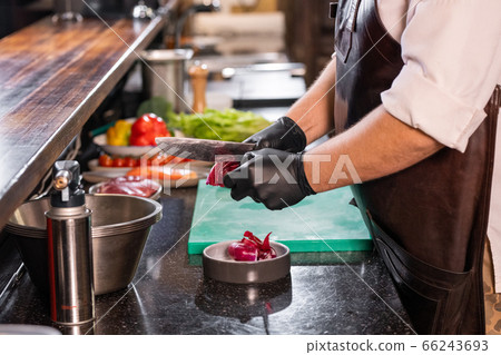 Peeling red onion Peeling red onion 66243693