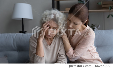 Caring adult daughter support unhappy senior mother Caring adult daughter support unhappy senior mother 66245909