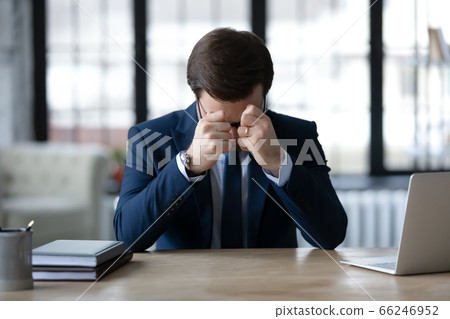 Distressed male boss feel frustrated with business failure Distressed male boss feel frustrated with business failure 66246952