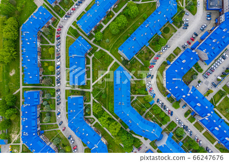 Aerial view of the housing estate with blue roofs. 66247676